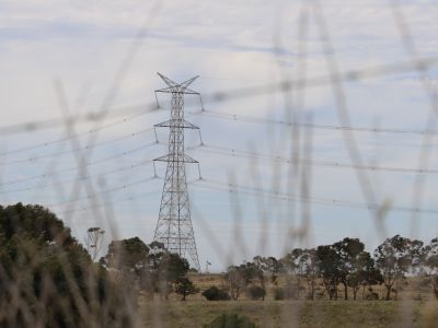 A 500 kV transmission tower outside of Moorabool from the fenceline. 